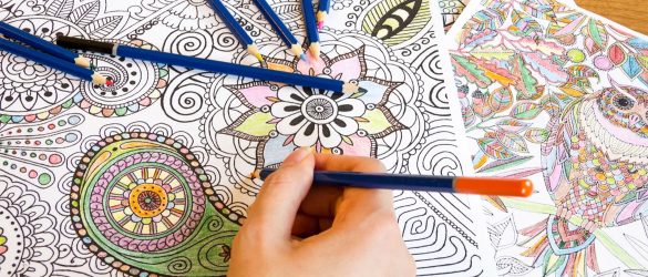 Colouring a mandala design.
