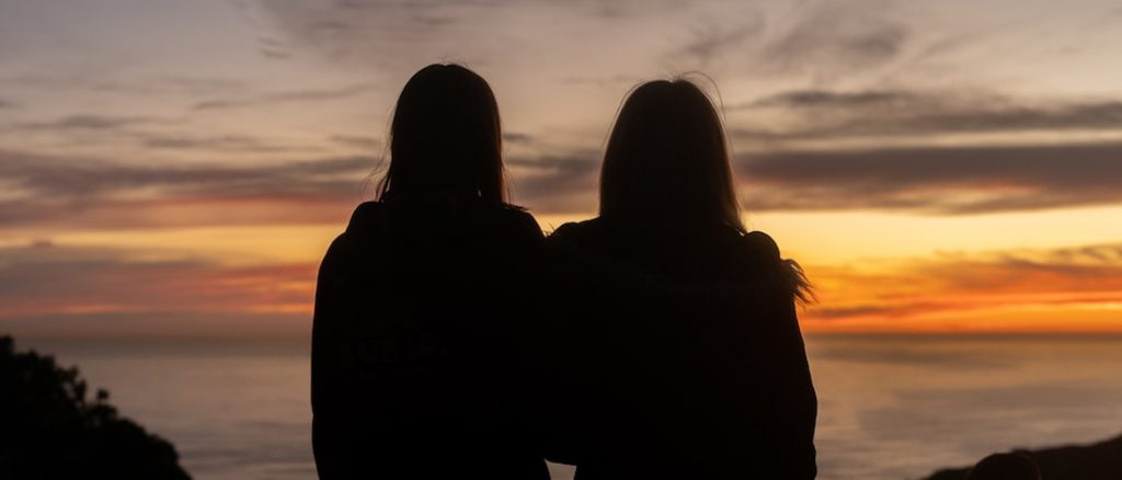Two friends watching the sky
