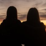 Two friends watching the sky