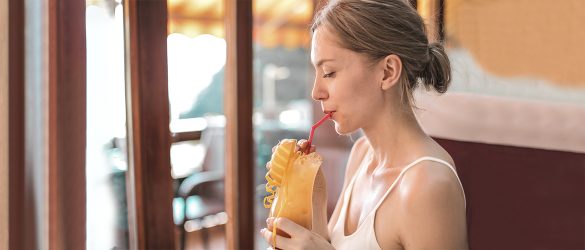 A girl drinking juice