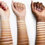 Shades of foundation swatched on different skin tones