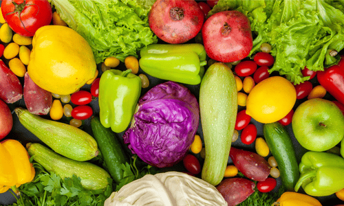 mix of multiple healthy and colourful fruits and vegetables.