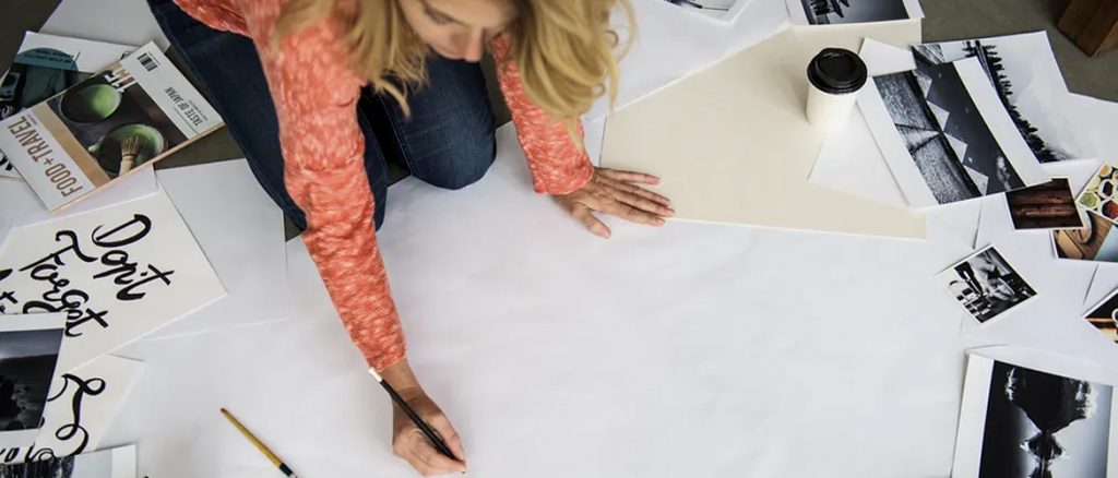 A woman is working in a messy place